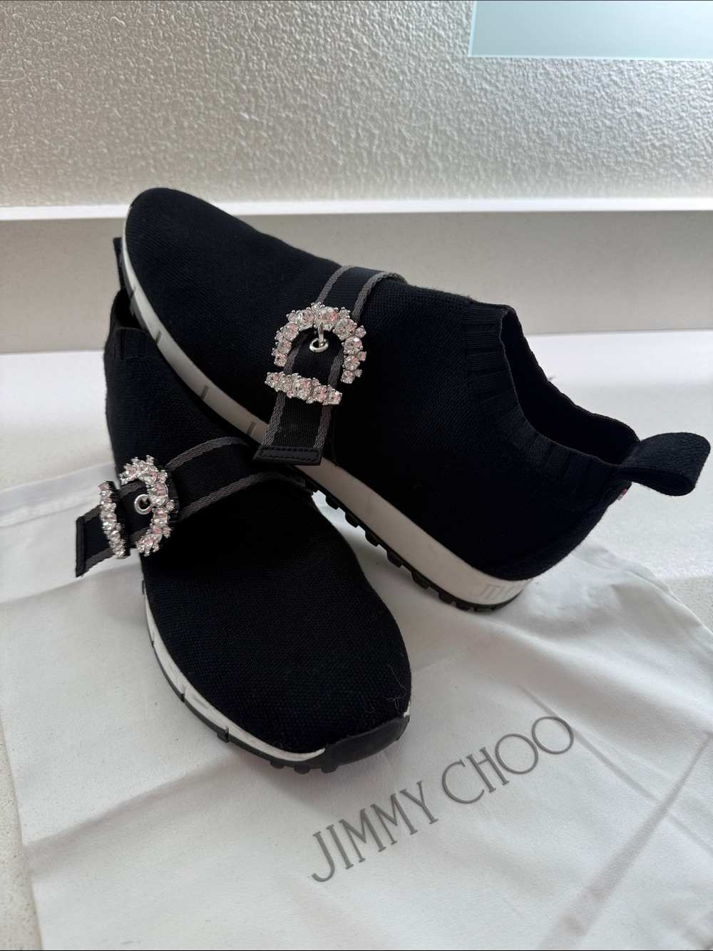 Jimmy Choo Black Knit Slip-On Sneakers with Crystal Buckle Detail - Size 40.5